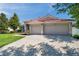 Beautiful single-Gathering home featuring an attached two-car garage, a red tile roof, and a well-manicured lawn at 2218 Valterra Vista Way, Valrico, FL 33594