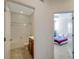 This hallway has access to a bedroom and a bathroom at 2218 Valterra Vista Way, Valrico, FL 33594