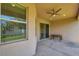 Covered patio with ceiling fan, great for outdoor entertaining and relaxation at 2218 Valterra Vista Way, Valrico, FL 33594