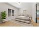 Staged bedroom features a platform bed, neutral rug, and matching side tables at 2429 1St N Ave, St Petersburg, FL 33713