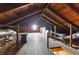 Spacious attic featuring wooden floors and a high, exposed-beam ceiling, offering potential for storage or conversion at 2710 8Th N Ave, St Petersburg, FL 33713