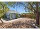 Backyard features a pergola, small trees and a well maintained ground covering at 2710 8Th N Ave, St Petersburg, FL 33713