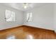 Bright bedroom with hardwood floors, large windows, and a ceiling fan at 2710 8Th N Ave, St Petersburg, FL 33713