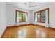 Bright bedroom featuring wood trim windows and hardwood floors, offering a warm and inviting ambiance at 2710 8Th N Ave, St Petersburg, FL 33713