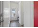 Hallway features storage cabinets and an exterior door letting in natural light at 2710 8Th N Ave, St Petersburg, FL 33713