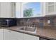 Close-up of kitchen sink and counter, showing modern appliances and finishes at 2710 8Th N Ave, St Petersburg, FL 33713