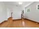 Bright and airy living room with original hardwood floors and arched doorways at 2710 8Th N Ave, St Petersburg, FL 33713