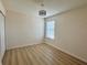 Bedroom features wood floors, closet and window at 2731 Hampton Green Ln, Brandon, FL 33511