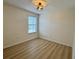 Bedroom features wood floors, ceiling fan and window at 2731 Hampton Green Ln, Brandon, FL 33511