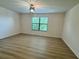 Cozy bedroom with hardwood floors and natural light at 2731 Hampton Green Ln, Brandon, FL 33511