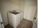 Convenient laundry room features full-size washer and dryer at 2731 Hampton Green Ln, Brandon, FL 33511