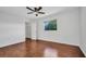 Comfortable bedroom with wood floors, closet, and a window offering a pleasant view at 280 Fortaleza St, Punta Gorda, FL 33983