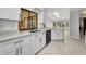 Bright kitchen featuring white cabinets, granite countertops, and stainless steel appliances at 280 Fortaleza St, Punta Gorda, FL 33983