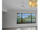 Bright living room with large windows and tile flooring at 280 Fortaleza St, Punta Gorda, FL 33983