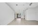 Open floor plan with tile floors, ceiling fan and view of the backyard pool at 280 Fortaleza St, Punta Gorda, FL 33983