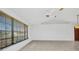 Large living room features tile flooring and a large window at 280 Fortaleza St, Punta Gorda, FL 33983