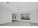 Spacious living room with tile flooring and large window at 280 Fortaleza St, Punta Gorda, FL 33983