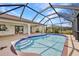 Screened-in pool with sun-shelf and patio, perfect for relaxation and entertainment at 280 Fortaleza St, Punta Gorda, FL 33983