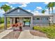 Community pool house with gated access to pool and beautiful landscaping at 28516 Tranquil Lake Cir, Wesley Chapel, FL 33543