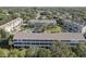 Aerial view of the condos, pool and mature landscaping at 29 Seagrape Cir, Clearwater, FL 33759
