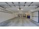Spacious garage with ample storage shelving at 29 Seagrape Cir, Clearwater, FL 33759
