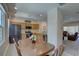 Cozy kitchen with stainless steel appliances and natural wood cabinetry at 29 Seagrape Cir, Clearwater, FL 33759