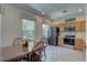 Bright kitchen with stainless steel appliances and a breakfast nook at 29 Seagrape Cir, Clearwater, FL 33759