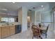 Open kitchen area with modern appliances and a view of the staircase at 29 Seagrape Cir, Clearwater, FL 33759