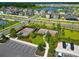 Aerial view of two basketball courts, offering recreational opportunities within the community at 3113 Marine Grass Dr, Wimauma, FL 33598