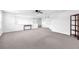 Bright loft with neutral paint, plush carpet, and lots of space at 3113 Marine Grass Dr, Wimauma, FL 33598