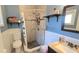 Updated bathroom featuring tiled shower with a stone floor, and modern fixtures for a fresh feel at 342 N 40Th N St, St Petersburg, FL 33713