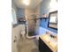 Stylish bathroom showcasing tiled shower, new vanity with sink, and modern fixtures for a contemporary touch at 342 N 40Th N St, St Petersburg, FL 33713