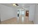 Open-concept living room featuring laminate floors and neutral walls, awaiting personal touches at 342 N 40Th N St, St Petersburg, FL 33713