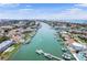 Aerial view of canal homes with boat docks and waterfront access at 350 Pinellas Bayway S # 7, Tierra Verde, FL 33715