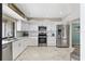 Well-equipped kitchen with stainless steel appliances and ample counter space at 350 Pinellas Bayway S # 7, Tierra Verde, FL 33715