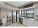 Updated kitchen with waterfront views and access to outdoor patio at 350 Pinellas Bayway S # 7, Tierra Verde, FL 33715