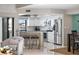 Modern kitchen with stainless steel appliances and counter seating at 350 Pinellas Bayway S # 7, Tierra Verde, FL 33715