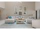 Cozy living room with plush seating and stylish decor at 350 Pinellas Bayway S # 7, Tierra Verde, FL 33715