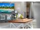 Tasteful coffee table arrangement with stylish TV stand at 350 Pinellas Bayway S # 7, Tierra Verde, FL 33715