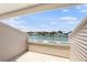 Breathtaking view of the water from the balcony overlooking a serene canal, offering a peaceful retreat at 350 Pinellas Bayway S # 7, Tierra Verde, FL 33715