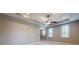 Generous bedroom offers soft carpet and modern ceiling fan at 3615 S Church Ave, Tampa, FL 33629