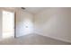 Cozy bedroom with neutral carpet and double door closet at 3615 S Church Ave, Tampa, FL 33629