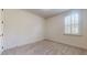 Clean and bright bedroom with neutral walls and natural light from shuttered windows at 3615 S Church Ave, Tampa, FL 33629