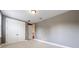 Comfortable bedroom includes soft carpet, neutral walls, closet, and access to the hallway at 3615 S Church Ave, Tampa, FL 33629