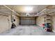 Spacious two car garage with overhead storage racks and storage shelving at 3615 S Church Ave, Tampa, FL 33629