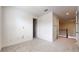 Bright hallway with neutral carpet and trim leads to other areas of the home at 3615 S Church Ave, Tampa, FL 33629