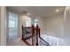 Upstairs hallway with carpeted floors, leading to multiple rooms at 3615 S Church Ave, Tampa, FL 33629