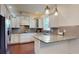 Modern kitchen featuring granite countertops, stainless steel appliances, and custom cabinetry at 3615 S Church Ave, Tampa, FL 33629