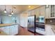 Open kitchen design with stainless steel appliances and granite countertops at 3615 S Church Ave, Tampa, FL 33629