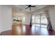 Open living area with hardwood floors, recessed lighting, and sliding glass doors to the patio at 3615 S Church Ave, Tampa, FL 33629